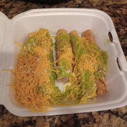 Rolled Tacos/Taquitos with Guacamole . Rolled Tacos/Taquitos with Guacamole .