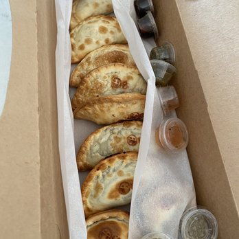 The Real Empanada - To go box of 12 empanada and dipping sauces - Empanadas Near Me - San Clemente, California The Real Empanada - To go box of 12 empanada and dipping sauces - Empanadas Near Me - San Clemente, California