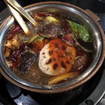 So Hot Hotpot - Mild spicy vegetarian broth with lotus root, baby bok choy, broccoli, and mushrooms - Hot Pot Near Me - Cary, North Carolina So Hot Hotpot - Mild spicy vegetarian broth with lotus root, baby bok choy, broccoli, and mushrooms - Hot Pot Near Me - Cary, North Carolina