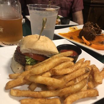 Roosterfish Pub - Impossible burger (we had them split it in two) with french fries - Pubs Near Me - Watkins Glen, New York Roosterfish Pub - Impossible burger (we had them split it in two) with french fries - Pubs Near Me - Watkins Glen, New York