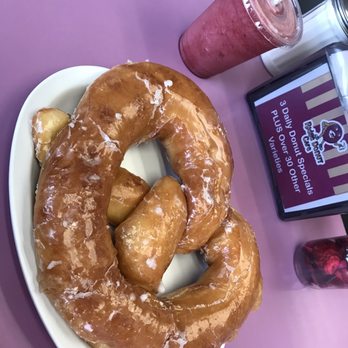 Ridge Donut Cafe - this is a berry smoothie and the HUGE pretzel donut!! - Donuts Near Me - Rochester, New York Ridge Donut Cafe - this is a berry smoothie and the HUGE pretzel donut!! - Donuts Near Me - Rochester, New York