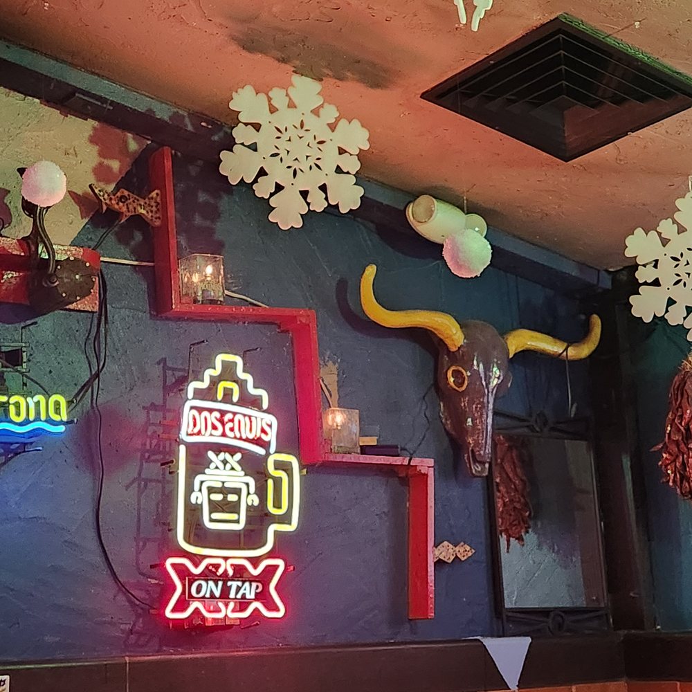 Los Dos Molinos - candles lit on the wall to honor my step dad, keith - New Mexican Cuisine Near Me - Phoenix, Arizona Los Dos Molinos - candles lit on the wall to honor my step dad, keith - New Mexican Cuisine Near Me - Phoenix, Arizona