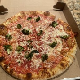 Cheese pizza with broccoli Cheese pizza with broccoli