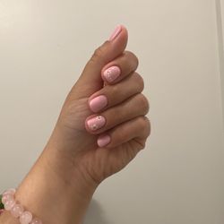 Nail and Wax - Pink gel manicure w/ flowers design