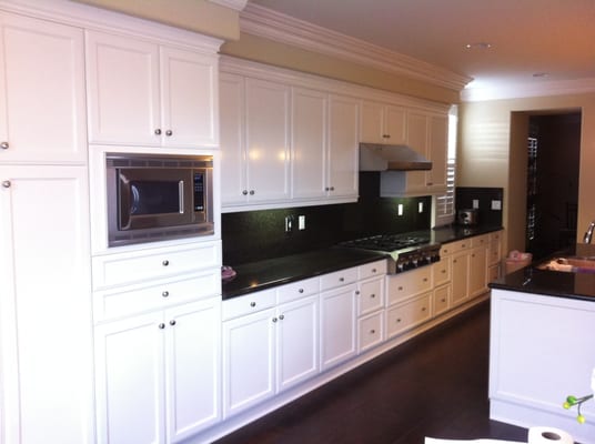 Cabinet Painting - This Kitchen was in need of a face lift, the home had recently been renovated. Now the owner loves cooking in his Kitchen! Cabinet Painting - This Kitchen was in need of a face lift, the home had recently been renovated. Now the owner loves cooking in his Kitchen!