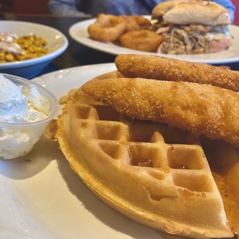 Hummingbird Restaurant - Chicken and waffles, and Cuban sandwich with onion rings. Also pictured on the left, Mexican corn. - American Near Me - Winfield, Illinois