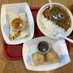Paneer kathi roll, samosas, and chana masala