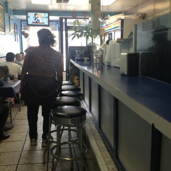 Flor Blanca Restaurant - Small place, 6 tables and then bar seating that faces the grill - Salvadoran Near Me - Los Angeles, California Flor Blanca Restaurant - Small place, 6 tables and then bar seating that faces the grill - Salvadoran Near Me - Los Angeles, California