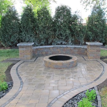 Parkview Landscapes - a brick patio with a fire pit - Landscaping Near Me Parkview Landscapes - a brick patio with a fire pit - Landscaping Near Me