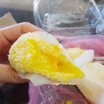 Top Bread - Box of four mochis ($4 total) with mango filling with even chunks of mango. Delicious - Bakeries Near Me - Boston, Massachusetts