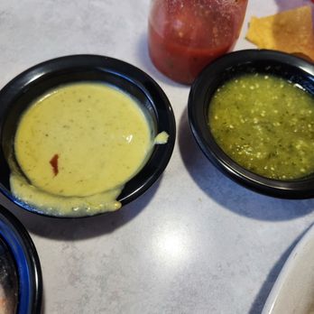 Los Pinguinos - Two different kinds of hot salsa, super yummy (my fav was the lighter colored one)! - Mexican Near Me - Saint Clair, Michigan Los Pinguinos - Two different kinds of hot salsa, super yummy (my fav was the lighter colored one)! - Mexican Near Me - Saint Clair, Michigan