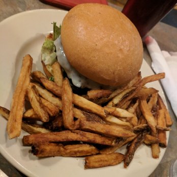 Reel Cafe - Their main cheese burger. My friend loved the fries! - American Near Me - Wilmington, North Carolina