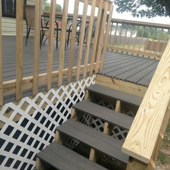 JD'S Pro Const - a deck with stairs and railings - Decks & Railing Near Me