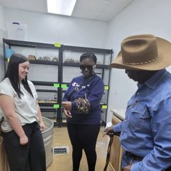 Russell Feed & Supply - Holding the ball python