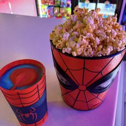 Free refills of popcorn and slushie with purchase of Spider-Man collectibles Free refills of popcorn and slushie with purchase of Spider-Man collectibles