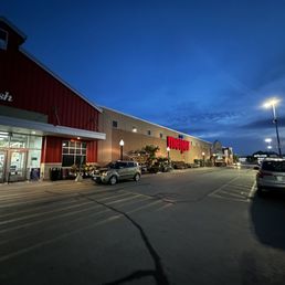 a view of a grocery store at night