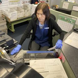 US Post Office - This is Claire, she does her job when Gloria isn't being a gross, rude Torta and butting in with her uselessness.