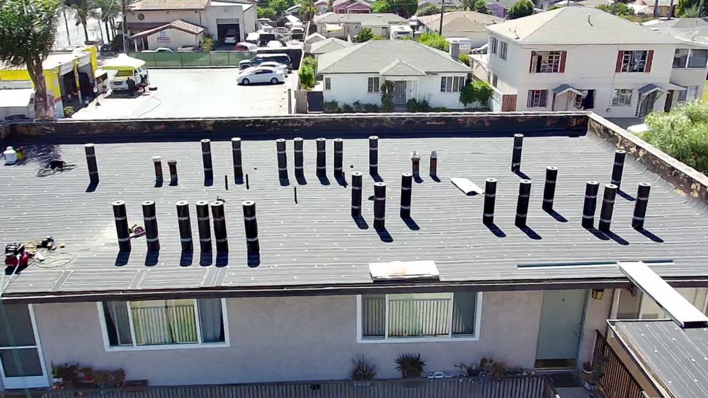 Slide of Queen Roofing