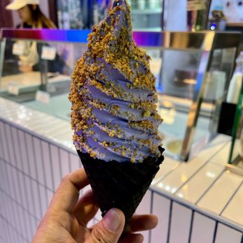 Soft Swerve - a hand holding a soft wafer - Ice Cream & Frozen Yogurt Near Me - Flushing, New York Soft Swerve - a hand holding a soft wafer - Ice Cream & Frozen Yogurt Near Me - Flushing, New York