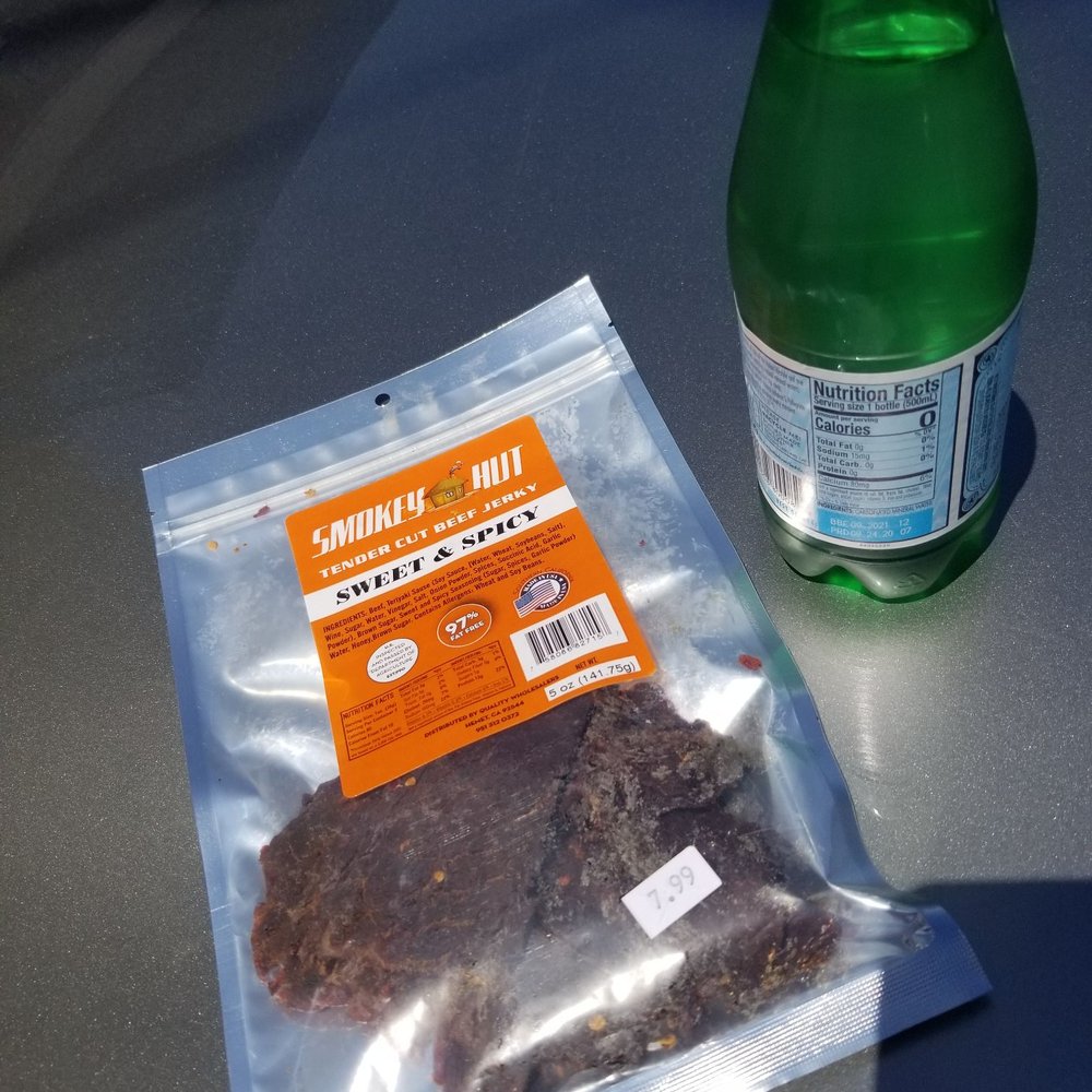 Skip's - a bottle and a bag of food on a table - Grocery Near Me - Mecca, California
