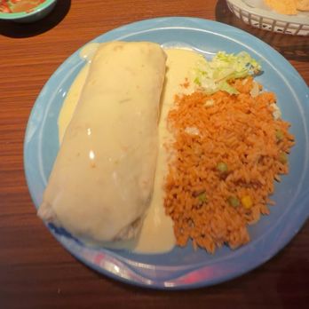 El Mariachi - burrito with queso on top and a side of rice - Mexican Near Me - Novi, Michigan El Mariachi - burrito with queso on top and a side of rice - Mexican Near Me - Novi, Michigan