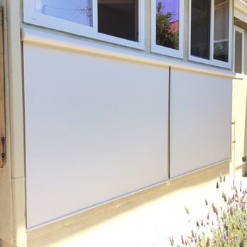 Shutter Pros - Outdoor roller shades on cable guides. - Shutters Near Me Shutter Pros - Outdoor roller shades on cable guides. - Shutters Near Me