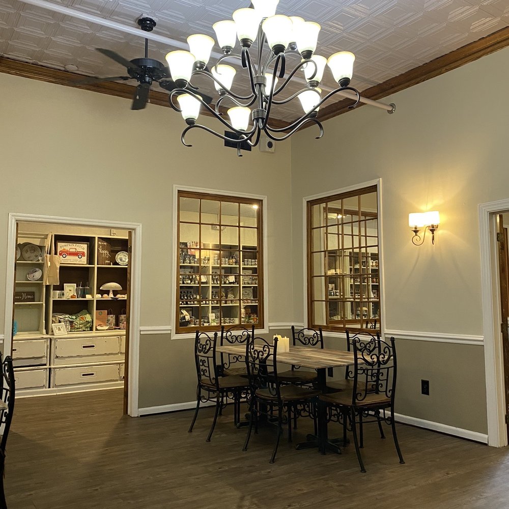 Sugar Magnolia Cafe - a dining room with a chandelier - Cafes Near Me - Wake Forest, North Carolina Sugar Magnolia Cafe - a dining room with a chandelier - Cafes Near Me - Wake Forest, North Carolina