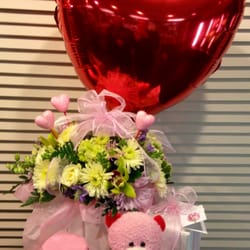 Dutch Flower Lady - "Box" arrangement with bear, balloon, chocolates and at the store made, rose peddle sugar scrub! A real treat!