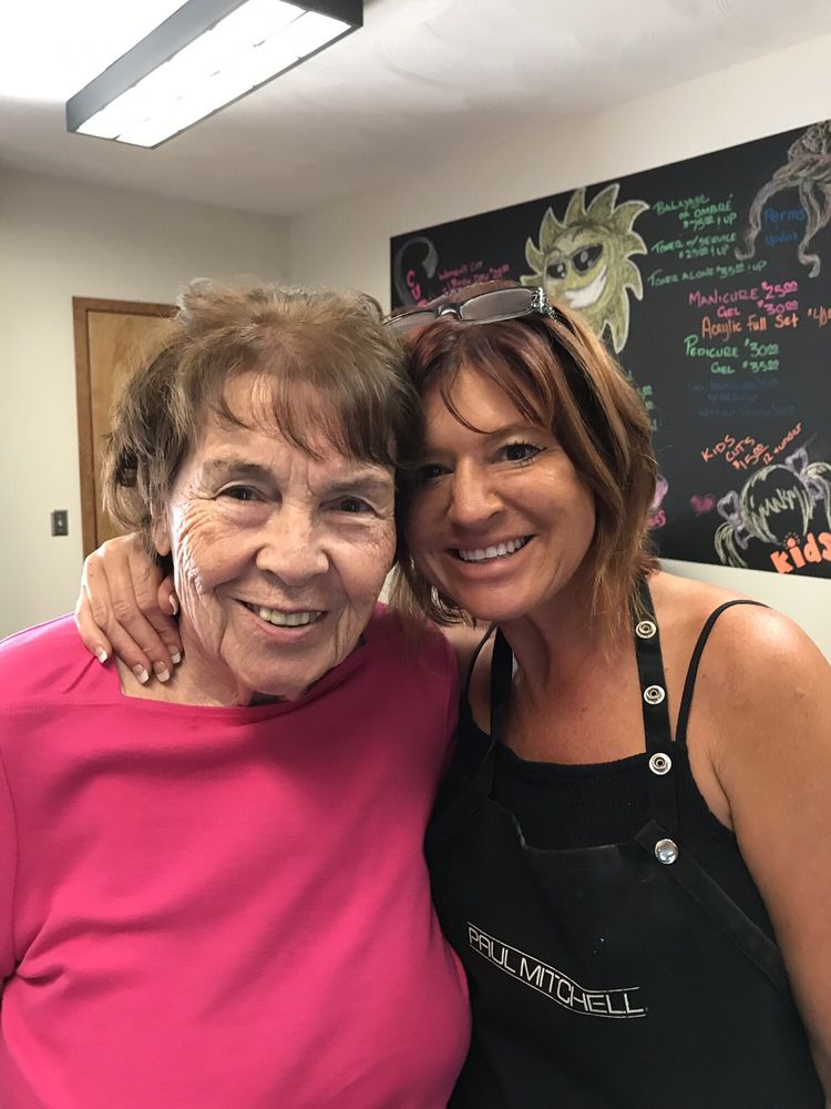 Krista Leann's Studio of Hair Design Logo