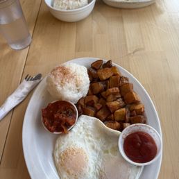À la cart eggs and potatoes with a side of rice and kimchi & omelette with a side of rice À la cart eggs and potatoes with a side of rice and kimchi & omelette with a side of rice