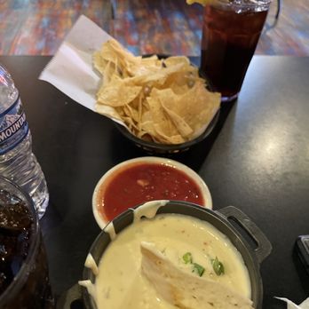 Casa Rio Tex Mex Restaurant - Queso Dip, great crispy chips.  Tea with lemon. - Mexican Near Me - Anoka, Minnesota