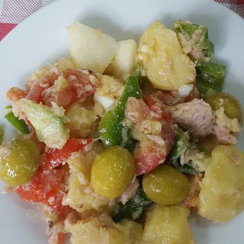 Campanilla - Tapas - potato salad with tuna, green olives, and vegetables - Spanish Near Me - Madrid, M Campanilla - Tapas - potato salad with tuna, green olives, and vegetables - Spanish Near Me - Madrid, M