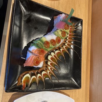 Sakura Nami - a plate of sushi and a bowl of sauce - Sushi Bars Near Me - Clarendon Hills, Illinois Sakura Nami - a plate of sushi and a bowl of sauce - Sushi Bars Near Me - Clarendon Hills, Illinois