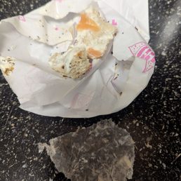 Paper tucked inside sandwich and then eaten. Paper tucked inside sandwich and then eaten.