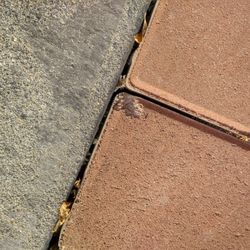 Dorset Landscaping - One of many bricks with little sand. This brick is chipped as well.