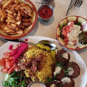 Tanoor - Falafel plate with a side of fries a d stuffed grape leaf - Lebanese Near Me - Sammamish, Washington Tanoor - Falafel plate with a side of fries a d stuffed grape leaf - Lebanese Near Me - Sammamish, Washington