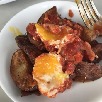 DiAnoia's Eatery - Eggs in purgatory over a side order of potatoes. So good - Delis Near Me - Pittsburgh, Pennsylvania