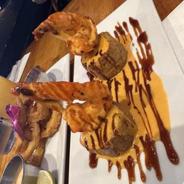 Shrimp Mofonguitos. The sauce was scrapped off the plate. Shrimp Mofonguitos. The sauce was scrapped off the plate.