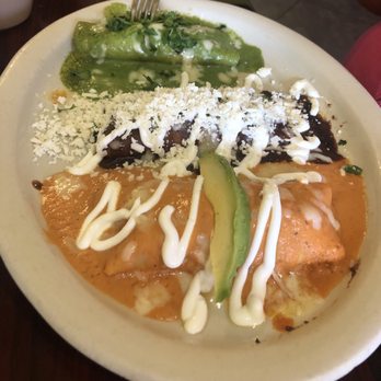 Erick's Tacos - Mixed chicken enchilada plate (came with rice and beans) July 2019 - Mexican Near Me - San Antonio, Texas Erick's Tacos - Mixed chicken enchilada plate (came with rice and beans) July 2019 - Mexican Near Me - San Antonio, Texas