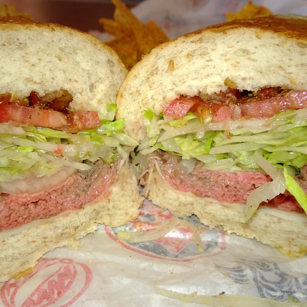 Jersey Mike's Subs - Famous Roast and Provolone on wheat bread with added bacon. - Sandwiches Near Me - San Diego, California Jersey Mike's Subs - Famous Roast and Provolone on wheat bread with added bacon. - Sandwiches Near Me - San Diego, California