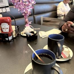 Freshly brewed Dark Roast Ground Coffee. Freshly brewed Dark Roast Ground Coffee.