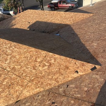 Crown Roofing & Coatings - Roof tear off in progress - Roofing Near Me