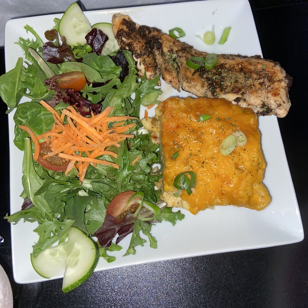 Nostrand Station Bar & Lounge - Jerk Chicken Mac & Cheese - Bars Near Me - Brooklyn, New York Nostrand Station Bar & Lounge - Jerk Chicken Mac & Cheese - Bars Near Me - Brooklyn, New York