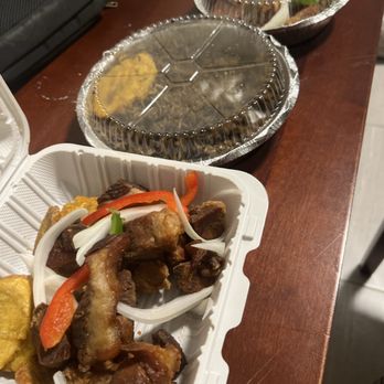 Haitian Caribbean Cuisine - Griot (fried pork) with diri a djon djon (black rice) & bun nun - Haitian Near Me - O, New Jersey Haitian Caribbean Cuisine - Griot (fried pork) with diri a djon djon (black rice) & bun nun - Haitian Near Me - O, New Jersey