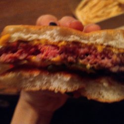 McDonald's - The burger which I bought which is a quarter pounder is cold and pink on the inside this is unacceptable