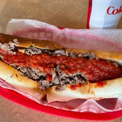 Napoli Pizza - Cheesesteak with mushrooms and sauce.