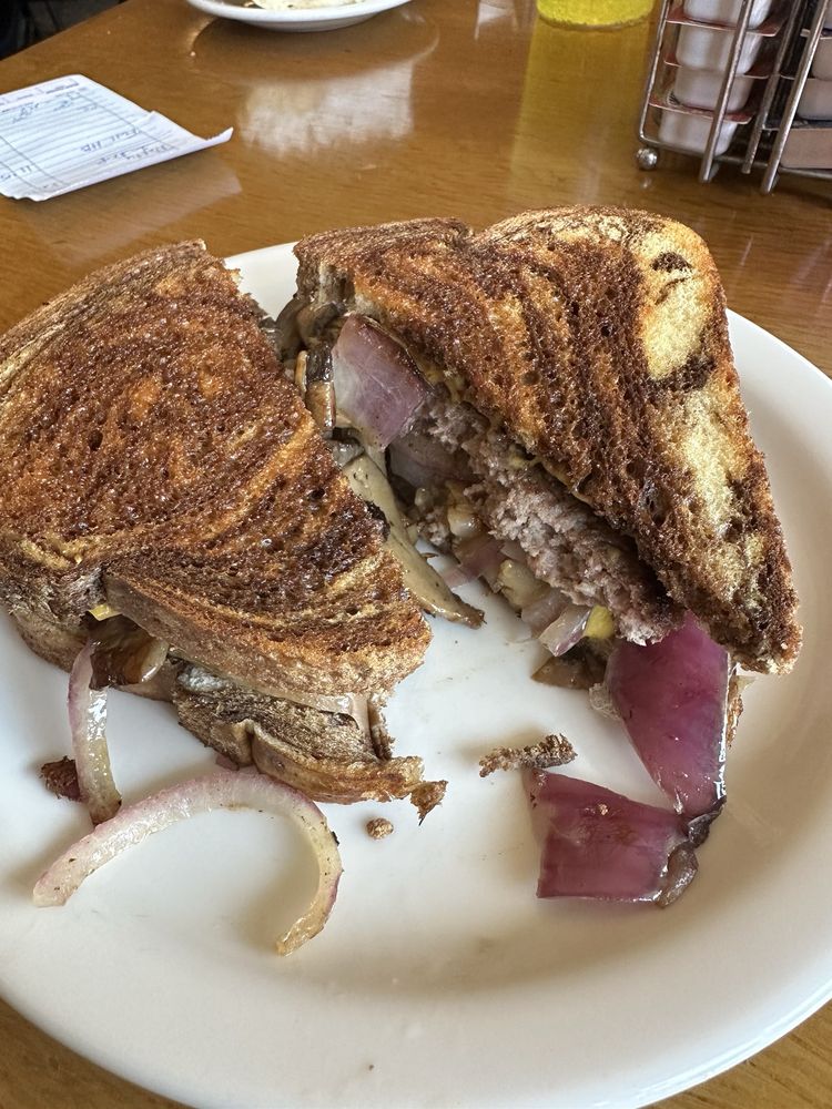 Buzz Cafe & Oxen House Logo