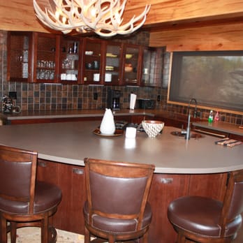 Legacy Contracting - a kitchen with a center island - General Contractors Near Me Legacy Contracting - a kitchen with a center island - General Contractors Near Me