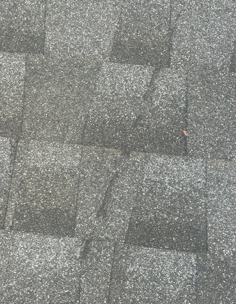 Slide of Monarch Roofing