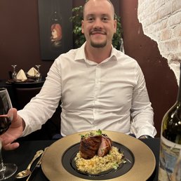 The most handsome man and a delicious duck entree The most handsome man and a delicious duck entree
